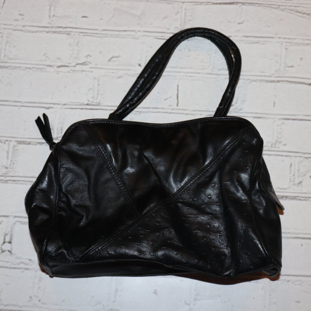 🖤 Black Satchel Bag A soft, slouchy black satchel with mixed‑texture panels